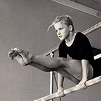 Hali Sheriff training on uneven parallel bars at the Nissen headquarters.